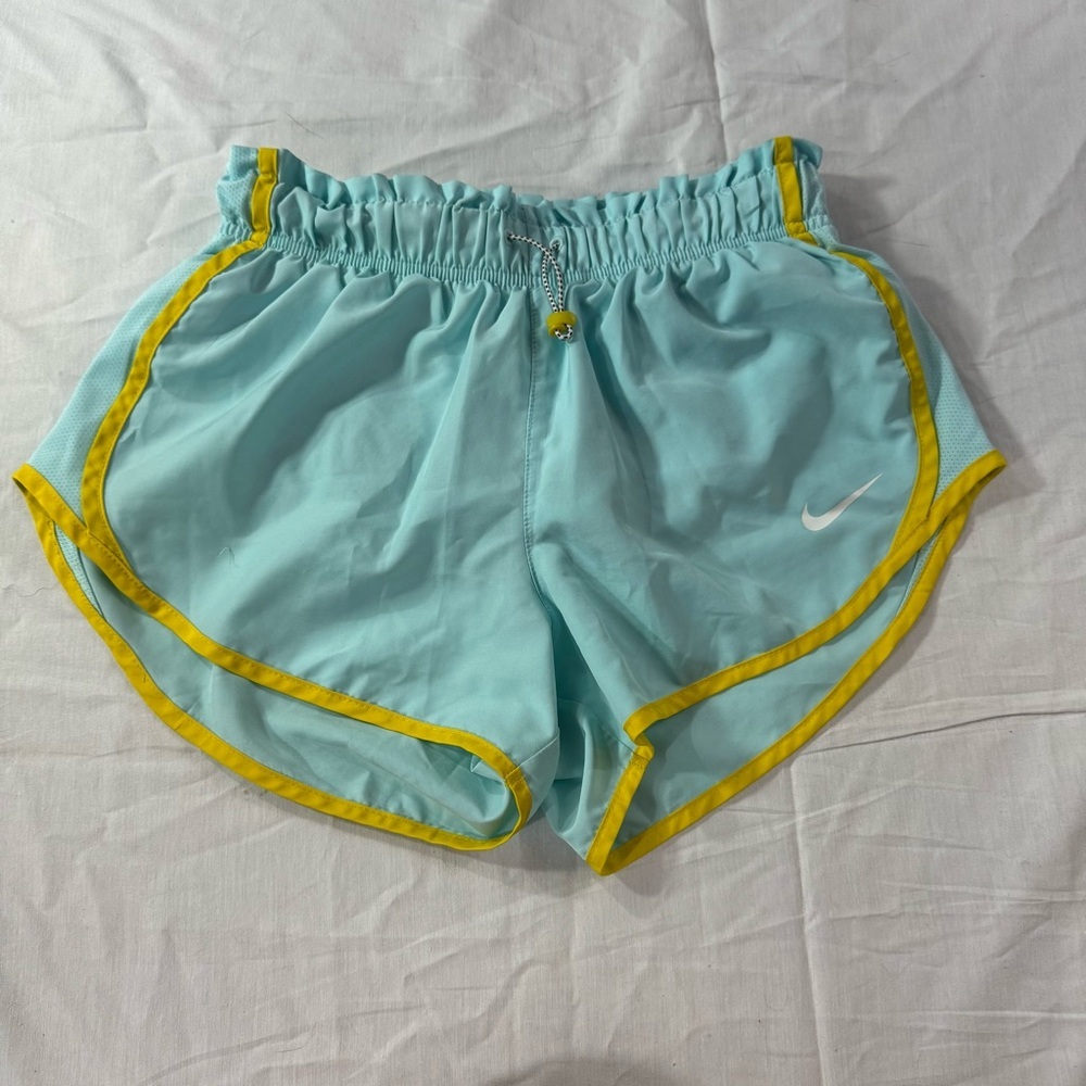 G76. Nike Women's Light Blue Running Shorts (S)‎
